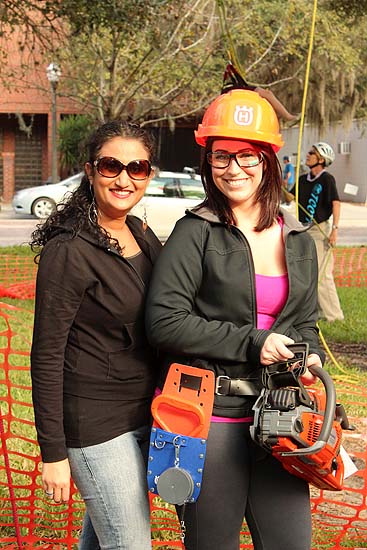 Fellow Tree Ladies helping sell raffle tickets for the saw.<br/>Geezers In The Treezers Competition, FL<br/>January 2013